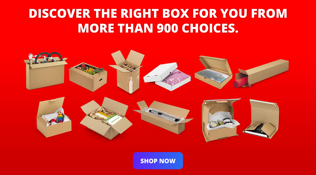Advertisement with bright red background showcasing various cardboard boxes filled with different items. The text reads 'Discover the right box for you from more than 900 choices.' and a blue button says 'SHOP NOW'
