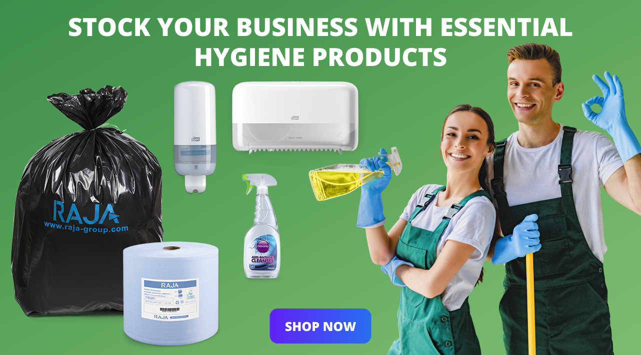 Promotional image with the text 'Stock your business with essential hygiene products' Two smiling people in work uniforms stand on a green background, holding cleaning supplies. Nearby are hygiene products like a soap dispenser, cleaning spray, paper towels, and a garbage bag. A blue button reads 'shop now'.