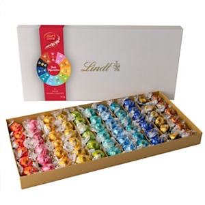 Lindt Boîte Rainbow - Assortiment en papillotte boules de chocolat au lait, noisette, praliné et noir - 825 g Lindt Boîte Rainbow - Assortiment en papillotte boules de chocolat au lait, noisette, praliné et noir - 825 g