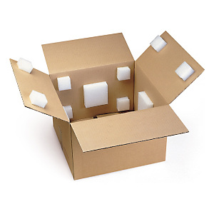 Self-adhesive blocks prevent movement in boxes