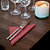Serviettes de table en papier Dinner Tork, coloris bordeaux, le colis de 150 - 2