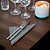 Serviettes de table en papier Dinner Tork, coloris gris, le colis de 150 - 2