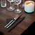 Serviettes de table en papier Dinner Tork, coloris noir, le colis de 150 - 2