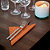 Serviettes de table en papier Dinner Tork, coloris orange, le colis de 150 - 2